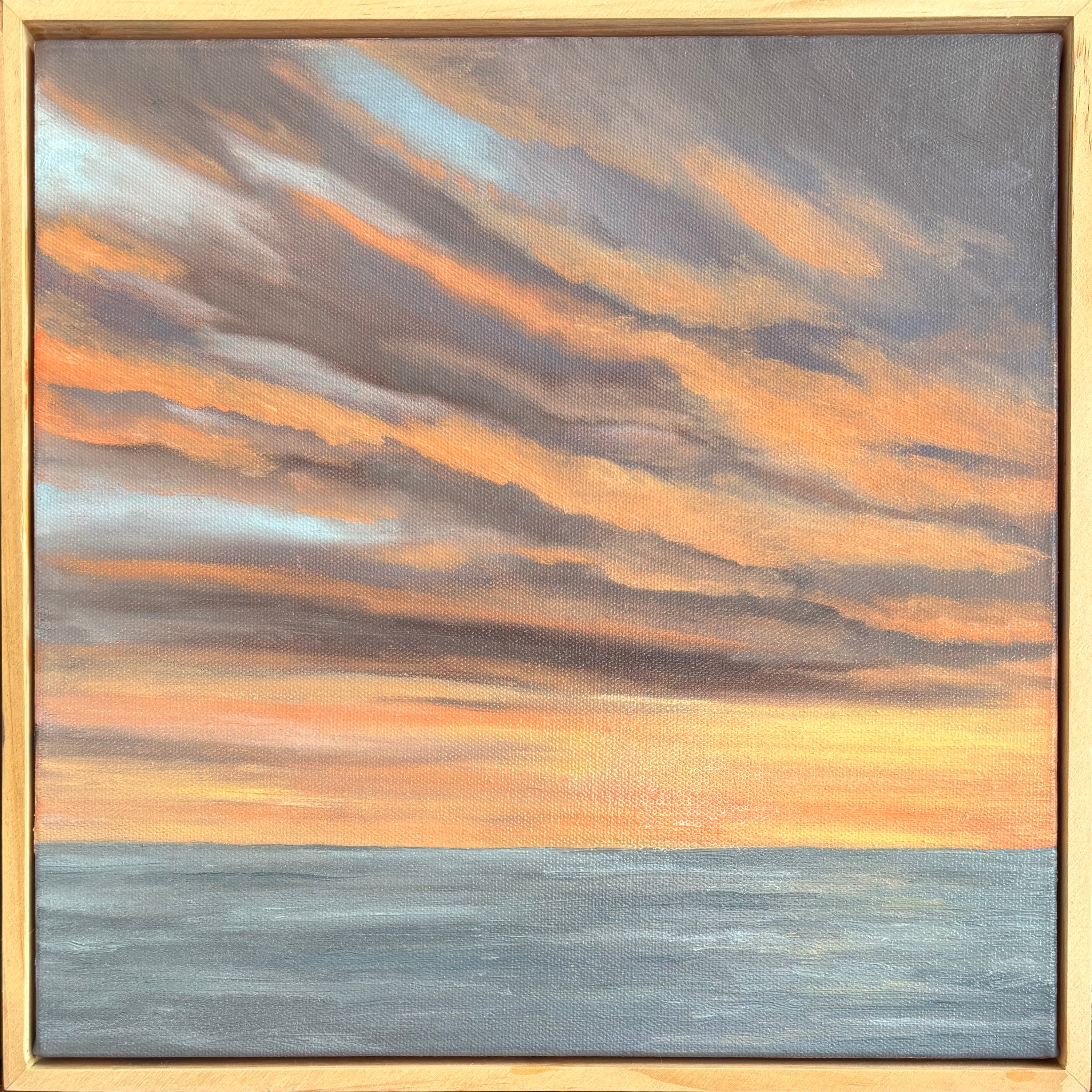 Painting of a sunset sky with orange and gray clouds over water.