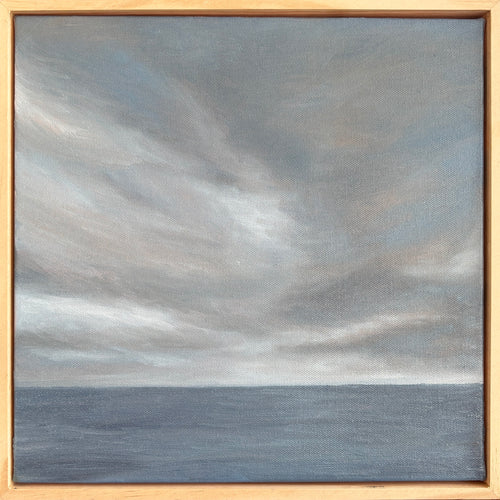 Painting of a cloudy sky over water with a wooden frame.